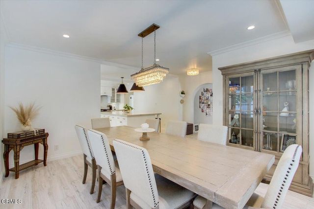 a kitchen with stainless steel appliances granite countertop a stove and cabinets