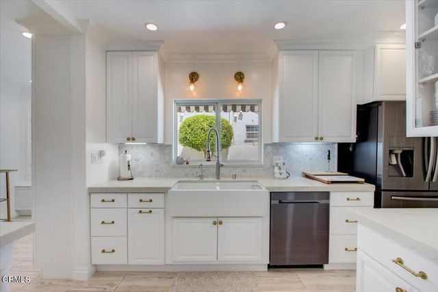 a bedroom with furniture and a bed