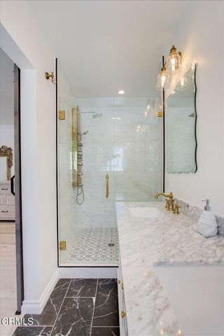 a swimming pool with outdoor seating and yard