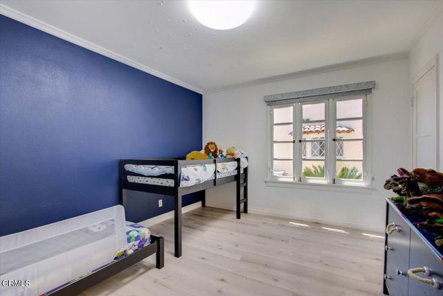 a view of an outdoor sitting area with furniture and umbrella