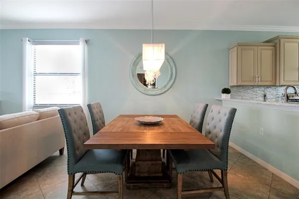 a room with furniture and a mirror