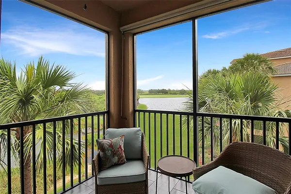 a balcony with furniture
