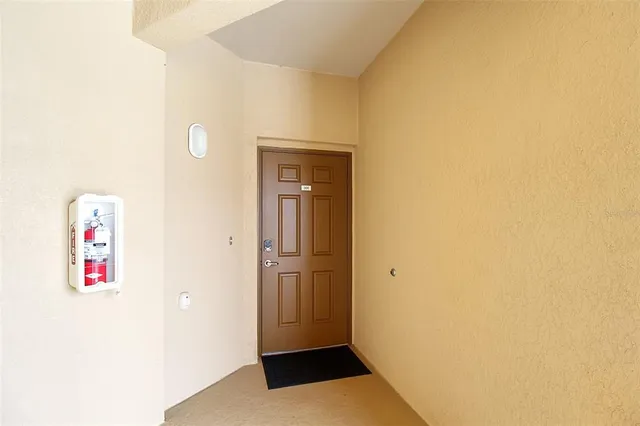 a city street lined with buildings and trees