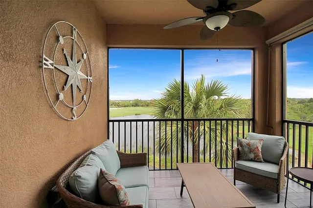 a view of a hallway with a bedroom and a bed