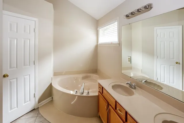 a bathroom with a sink and a bathtub