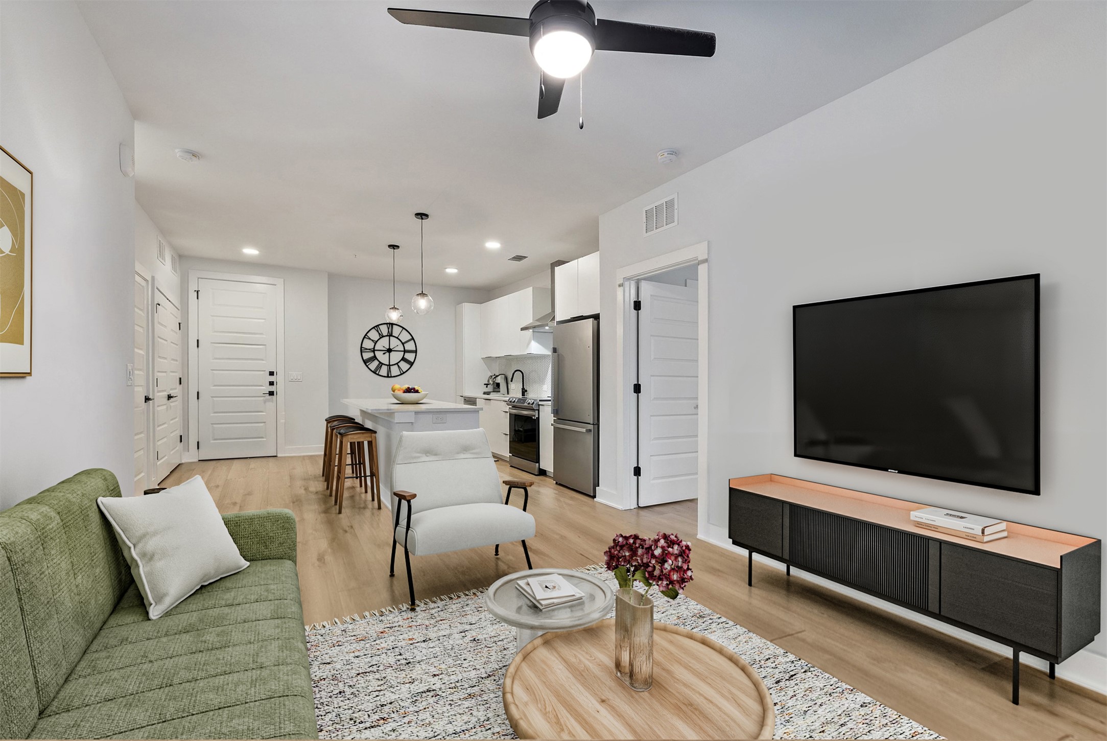 2500 Longview Street, Unit 418 Austin, TX 78705 - Photo 13 of 40 Living area featuring light wood-style floors, a ceiling fan, and recessed lighting
