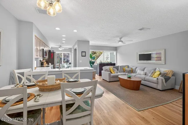a bedroom with a bed furniture and a book shelf