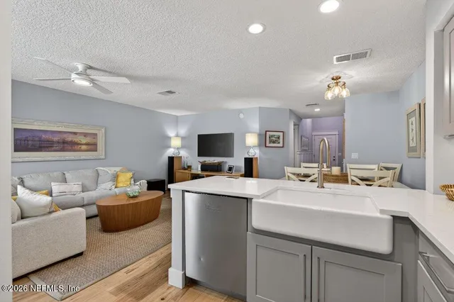 a garden with trees in front of it