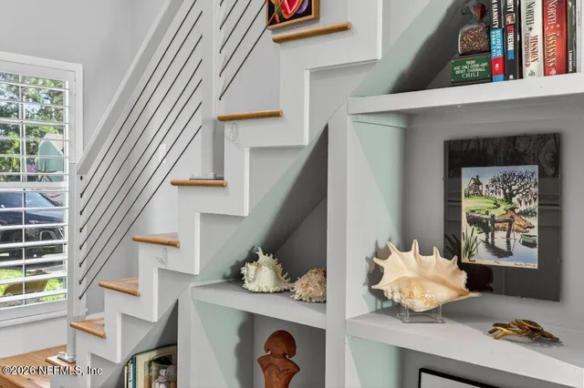 a bedroom with a bed and gym equipment