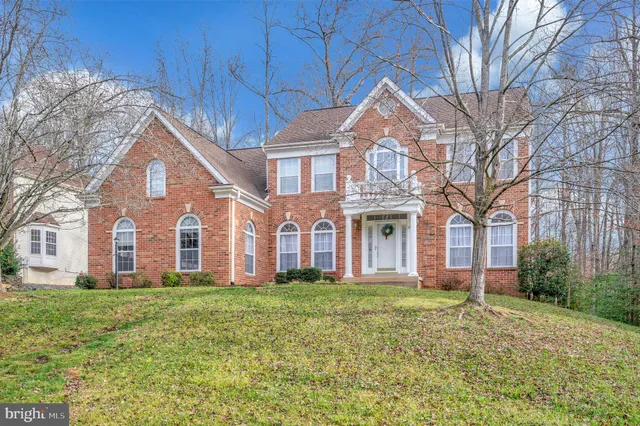 a view of outdoor space with deck and trees