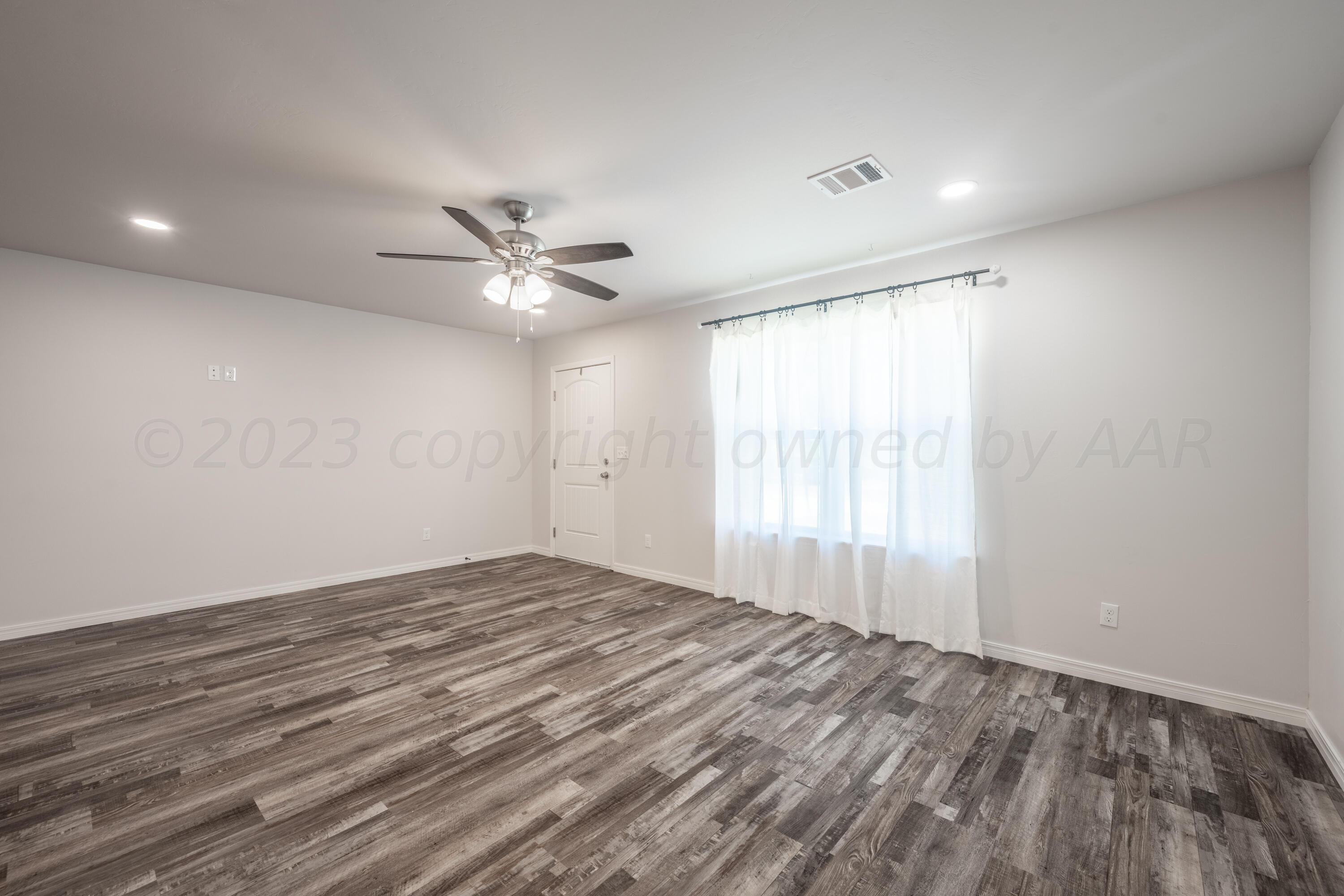 4120 South Ong Street Amarillo, TX 79110 - Photo 11 of 19 living room 2