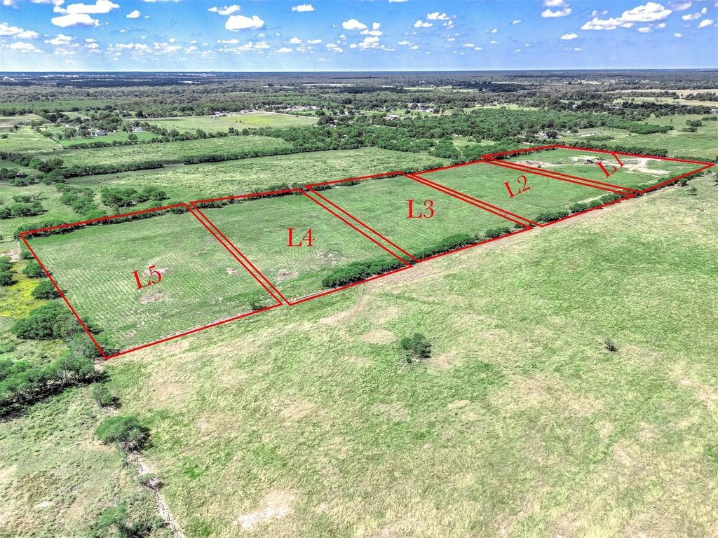 13931 Routt Point Road Needville, TX 77461 - Photo 6 of 11 a view of a tennis court