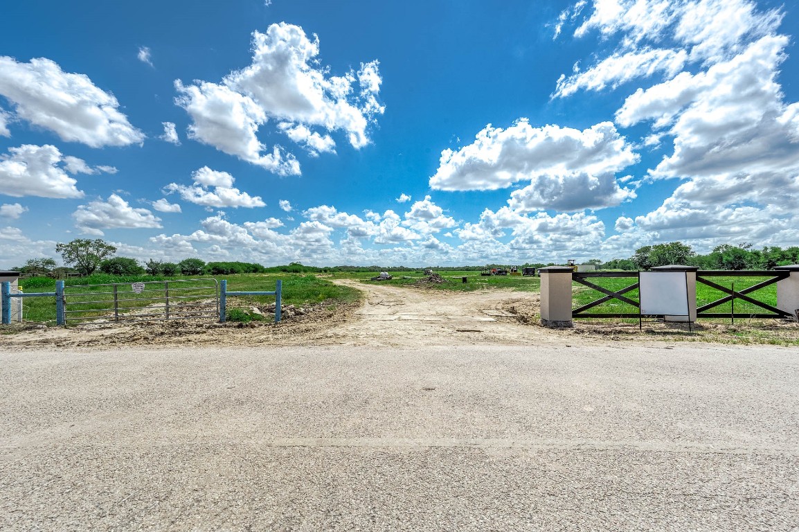 13931 Routt Point Road Needville, TX 77461 - Photo 10 of 11 a view of a house with a yard