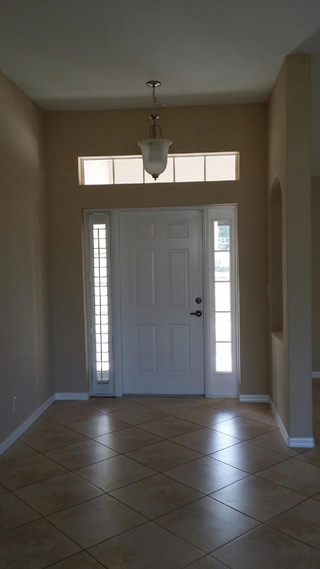 4025 Southwest Mackemer Road Port St. Lucie, FL 34953 - Photo 2 of 12 FRONT FOYER