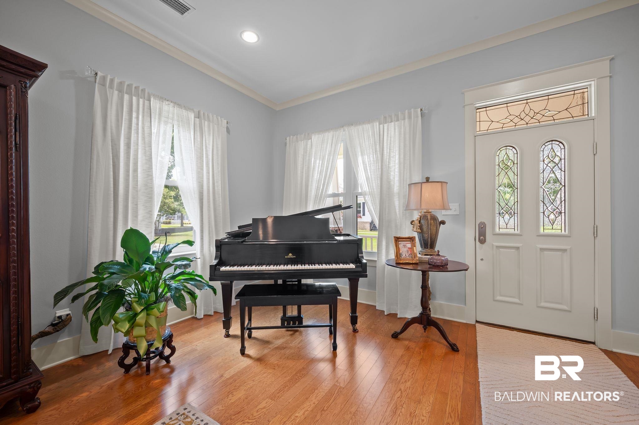 905 Buttercup Lane Foley, AL 36535 - Photo 22 of 47 Foyer featuring ornamental molding, wood finished floors, and recessed lighting
