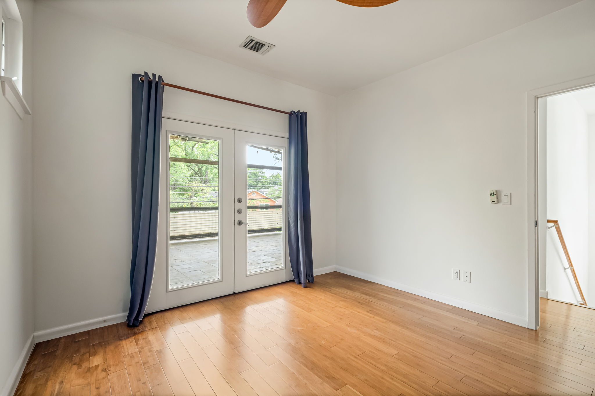 2202 Garden Street, Unit B Austin, TX 78702 - Photo 4 of 29 One of two upstairs bedrooms with access to rooftop patio