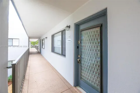 a view of an entryway with livingroom