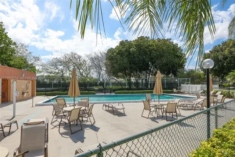 a view of a patio with swimming pool