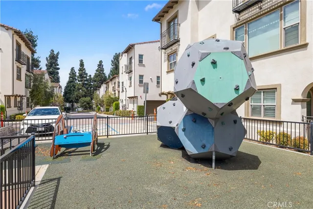 a car parked in front of a brick building