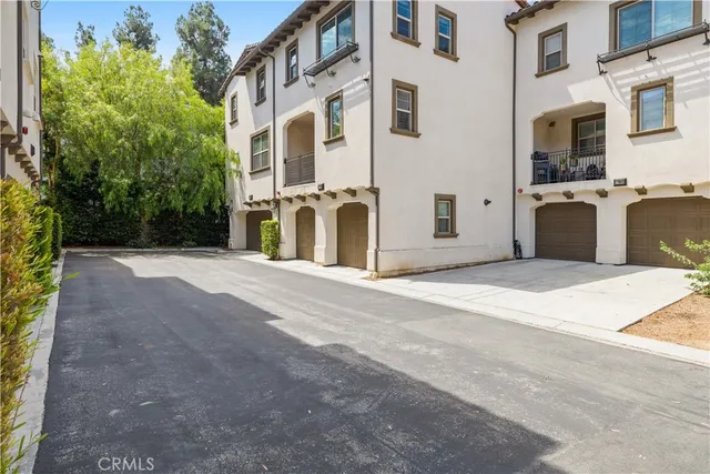 a view of a house with a street