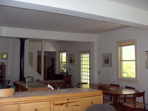 149 Tyringham Road Monterey, MA 01245 - Photo 4 of 6 a living room with furniture and a potted plant