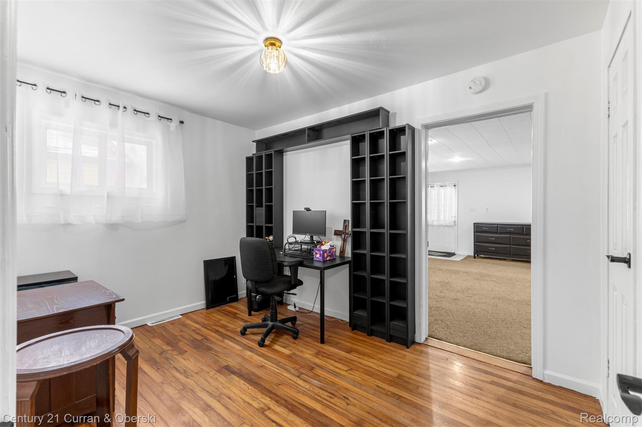 22327 Wick Road Taylor, MI 48180 - Photo 7 of 10 Office space with wood finished floors and baseboards