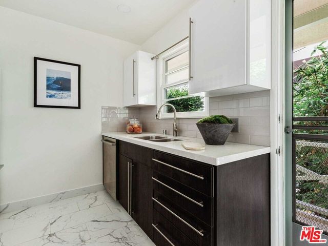 a view of a two chair in the balcony