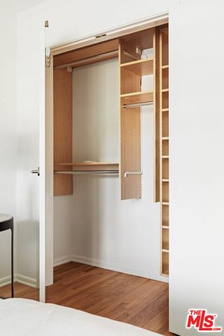 a bathroom with a sink a mirror and vanity