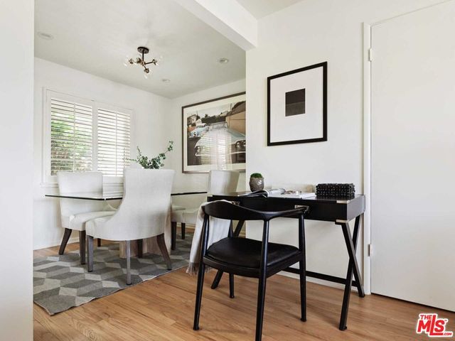a view of a livingroom with furniture and window