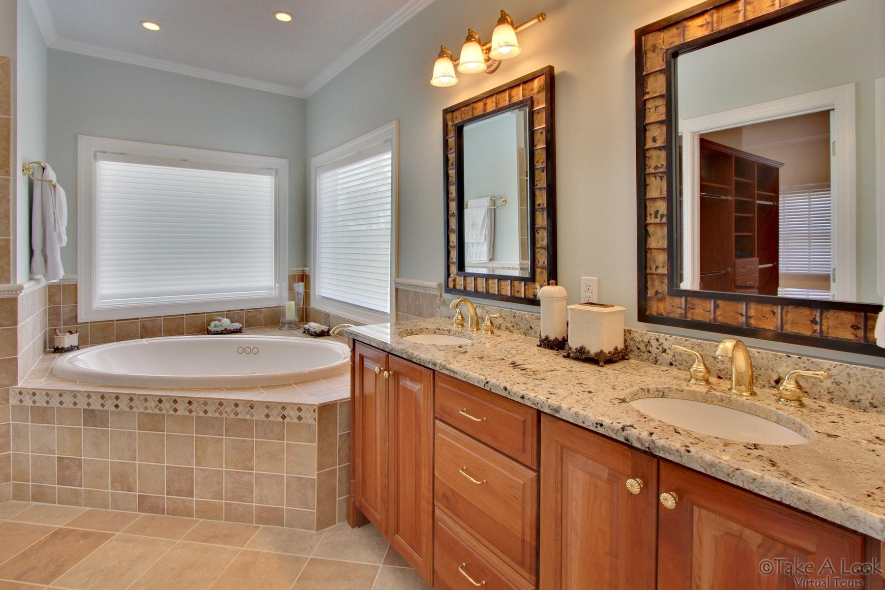 140 Calypso Road Moneta, VA 24121 - Photo 16 of 26 a bathroom with a granite countertop sink and a mirror