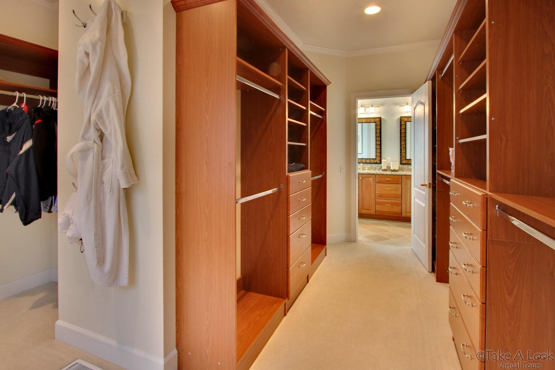 140 Calypso Road Moneta, VA 24121 - Photo 18 of 26 a view of walk in closet with clothes and shoes