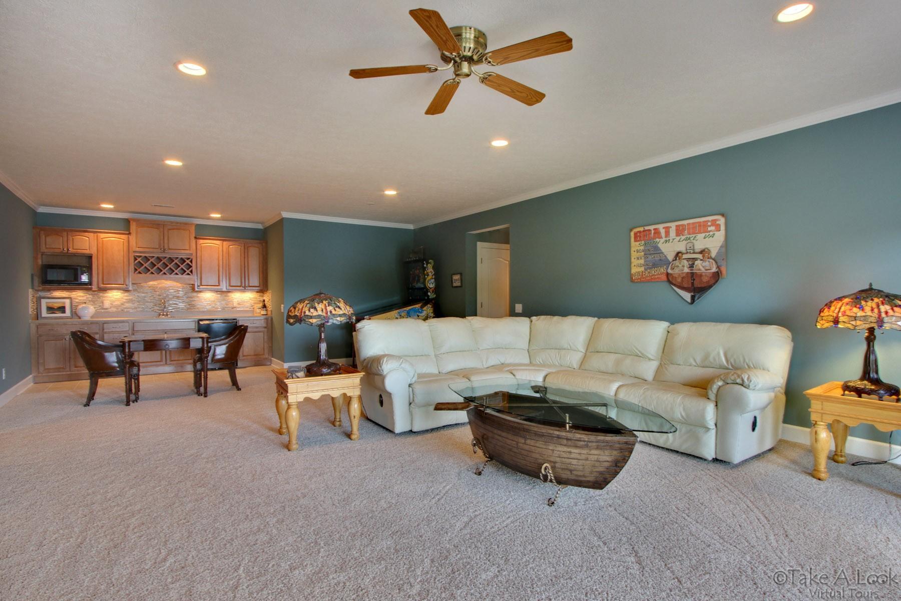 140 Calypso Road Moneta, VA 24121 - Photo 19 of 26 a living room with furniture and a large window