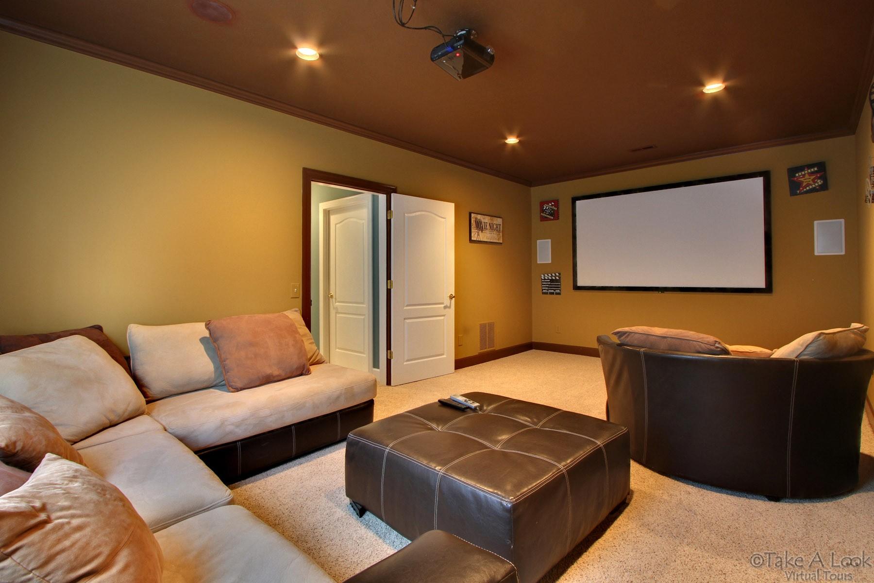 140 Calypso Road Moneta, VA 24121 - Photo 20 of 26 a living room with furniture and a flat screen tv