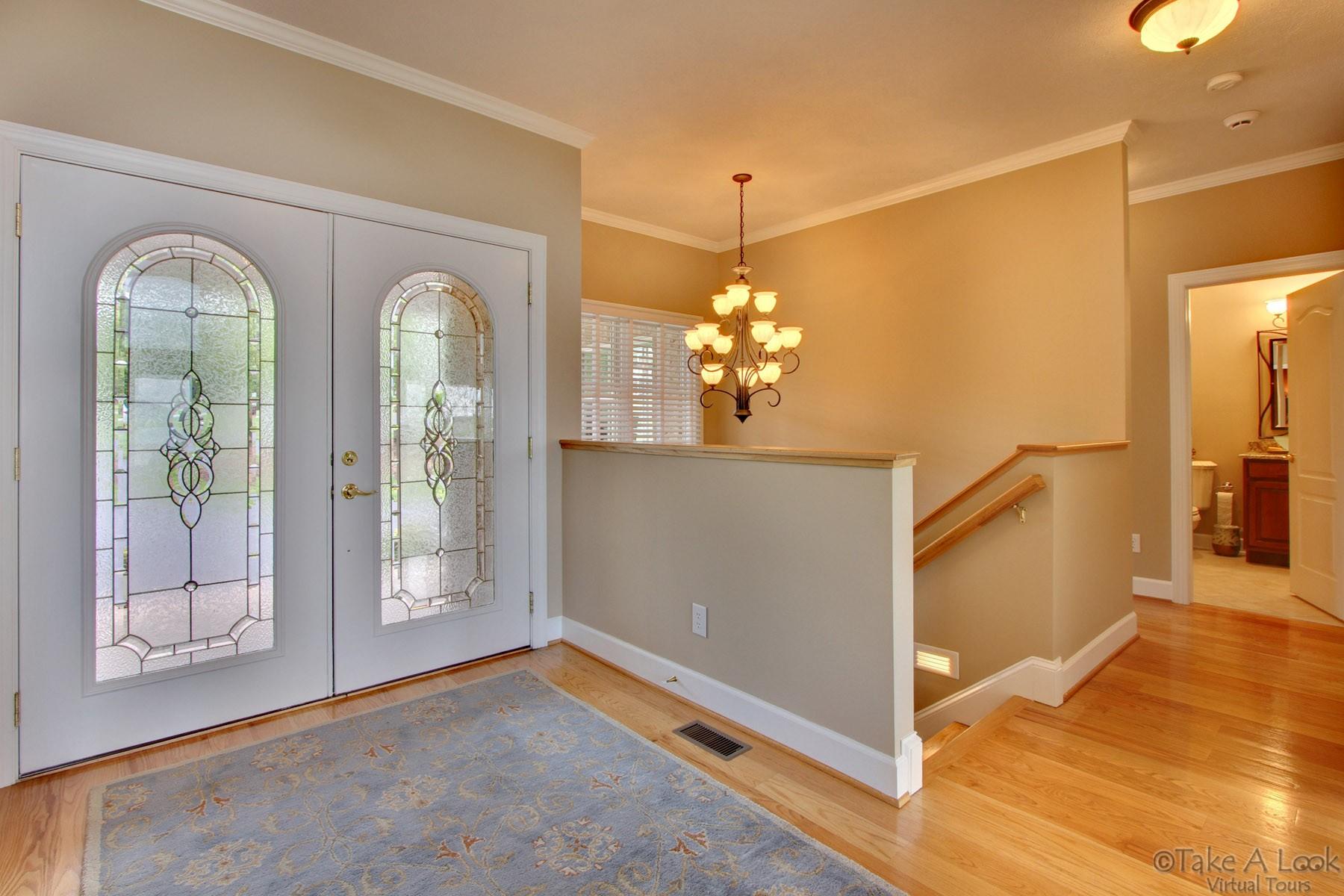 140 Calypso Road Moneta, VA 24121 - Photo 3 of 26 a view of a livingroom with wooden floor