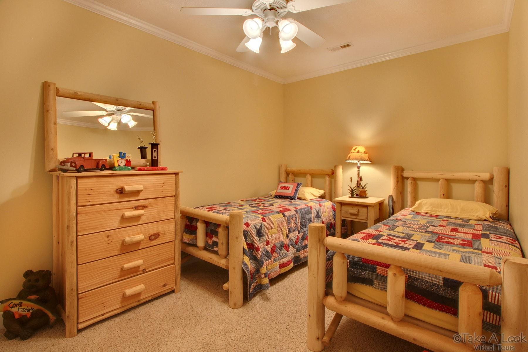 140 Calypso Road Moneta, VA 24121 - Photo 24 of 26 a bedroom with a bed and a cabinets