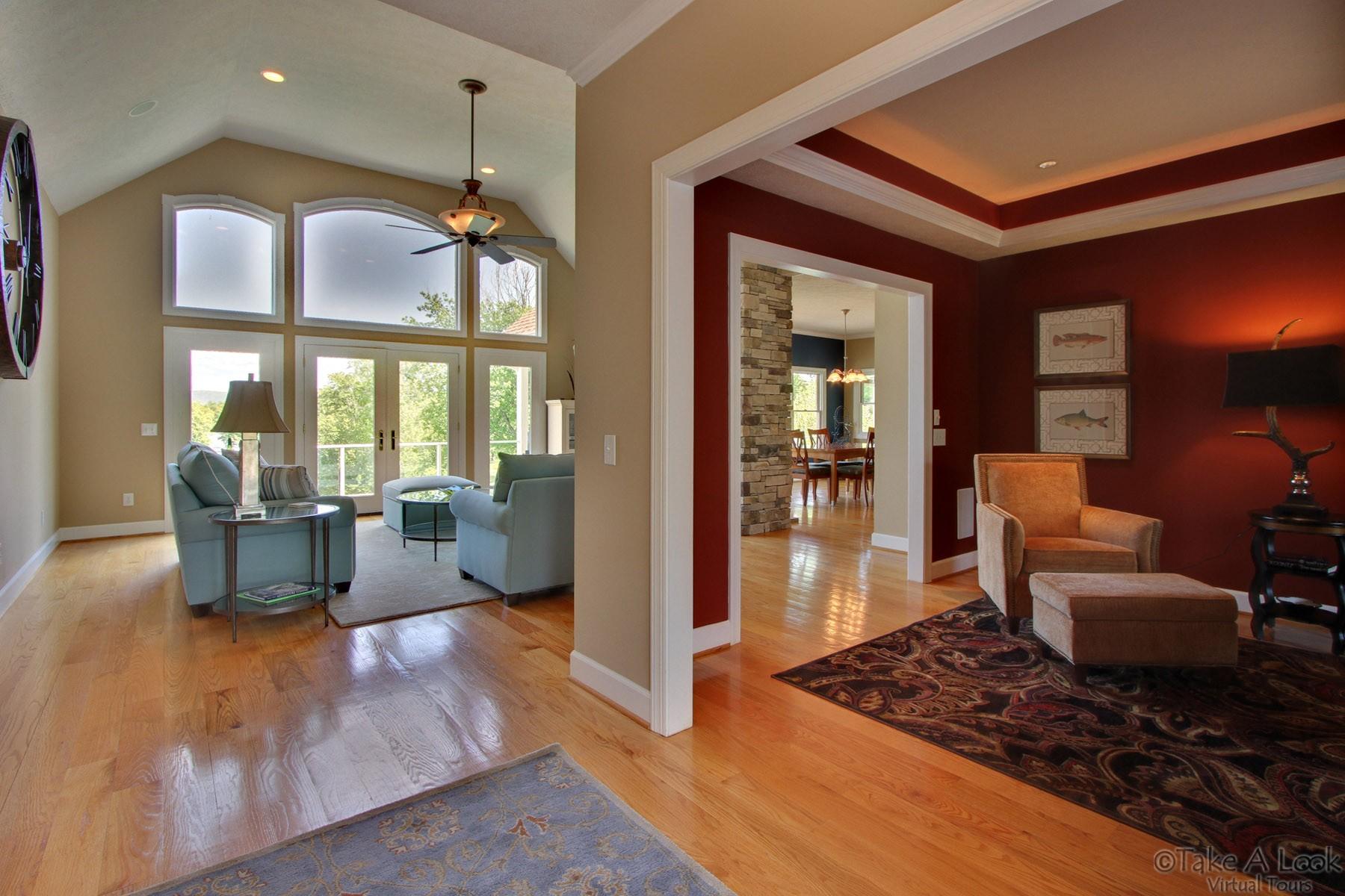 140 Calypso Road Moneta, VA 24121 - Photo 4 of 26 a living room with furniture rug and large windows