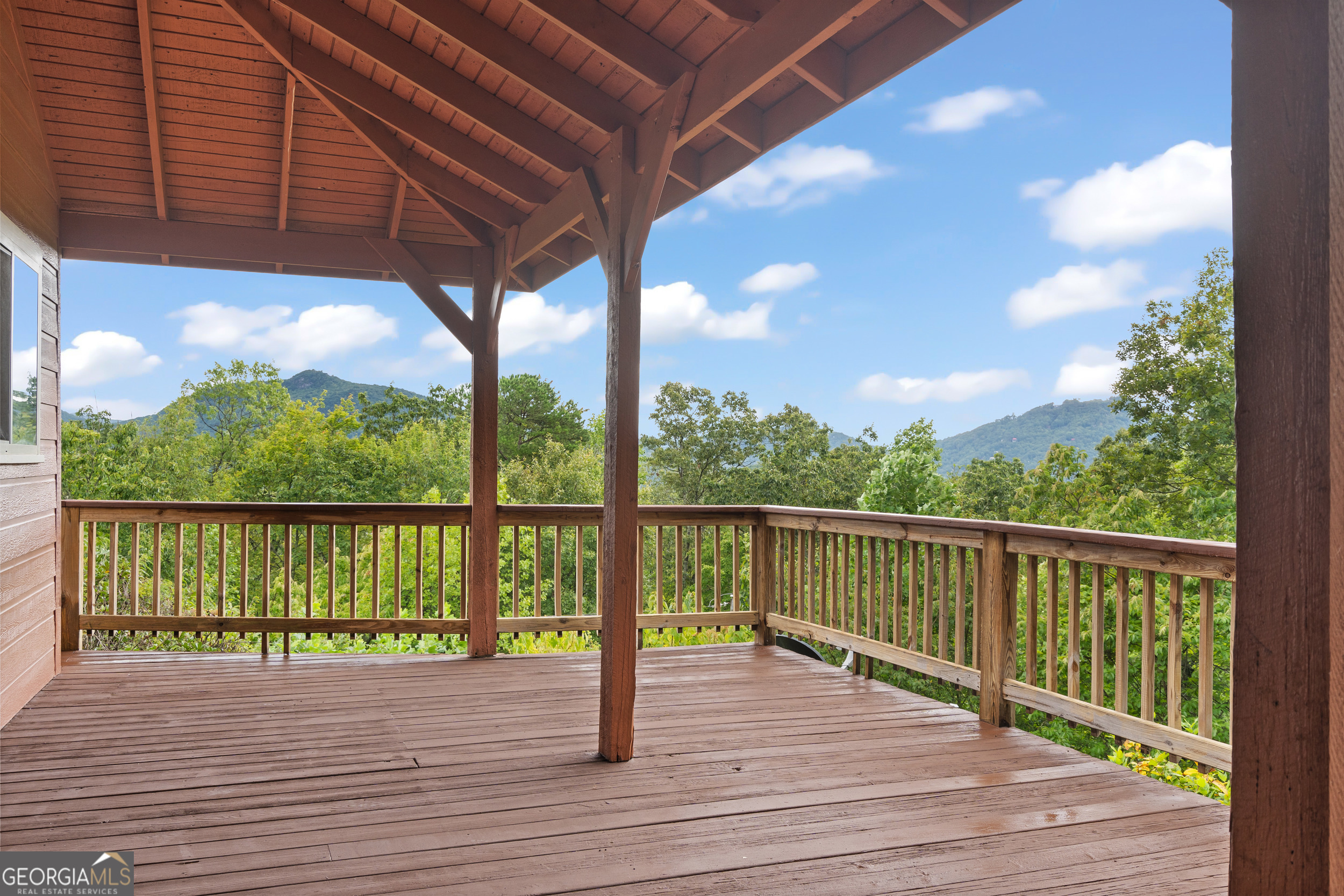 1387 Valley Street Clayton, GA 30525 - Photo 16 of 59 a view of a balcony with wooden floor