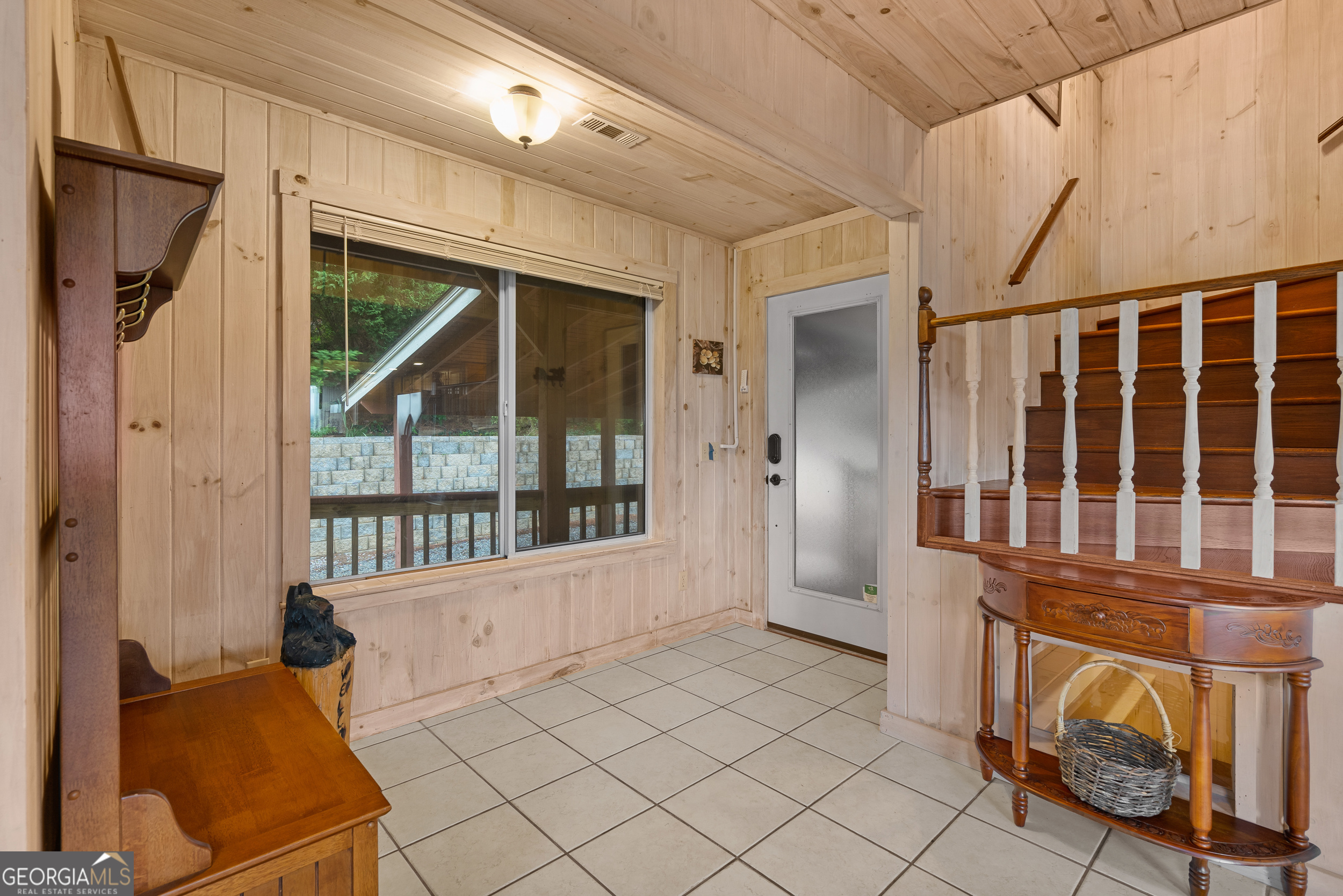 1387 Valley Street Clayton, GA 30525 - Photo 24 of 59 a view of an entryway with a floor to ceiling window