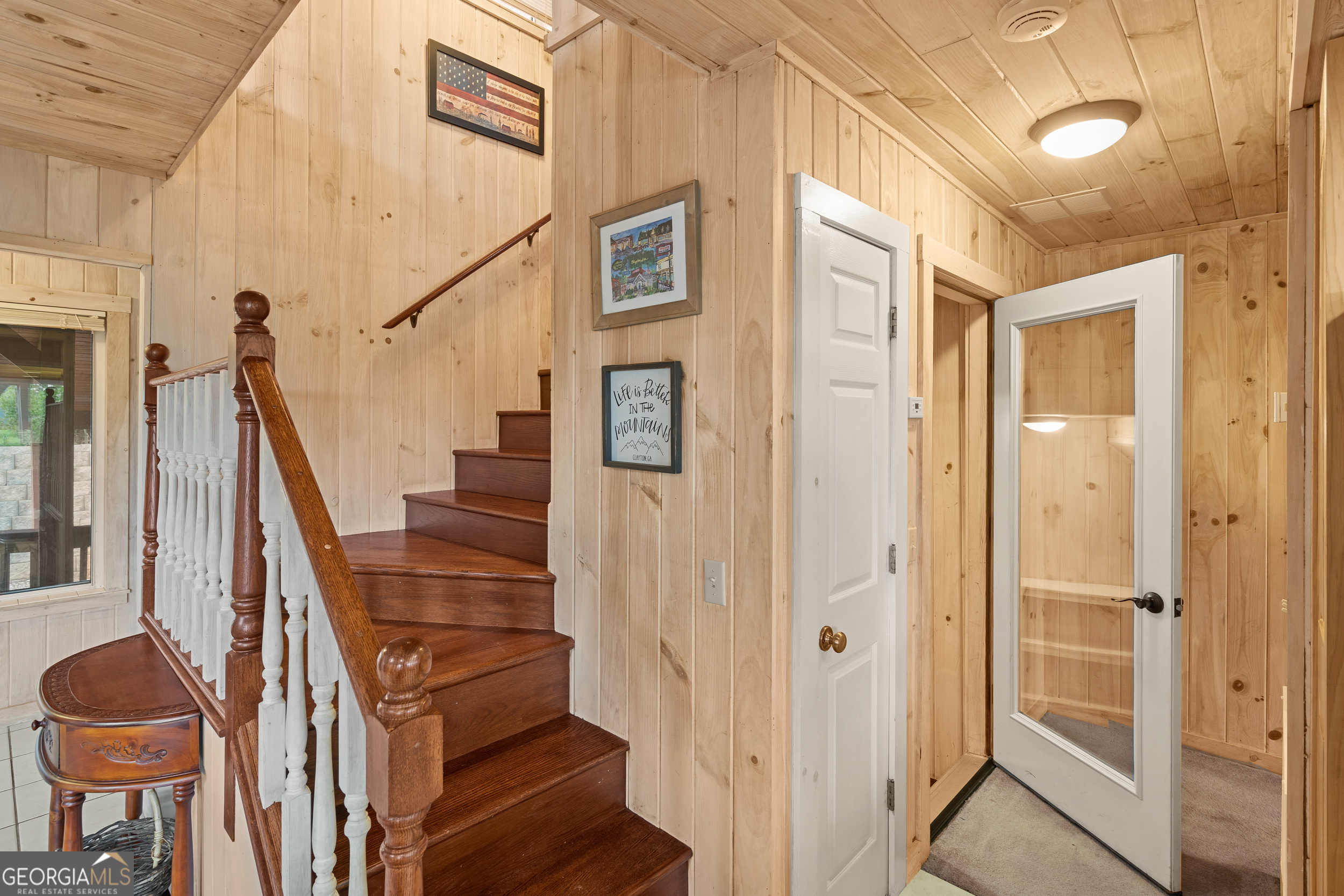 1387 Valley Street Clayton, GA 30525 - Photo 25 of 59 a view of an entryway with wooden floor and livingroom