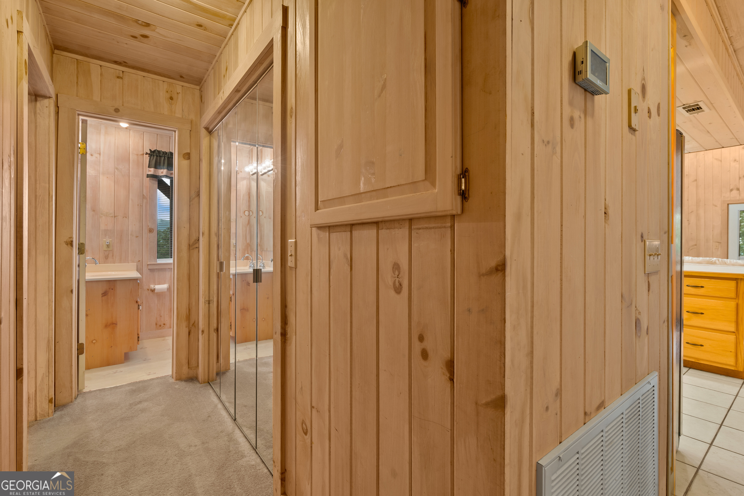 1387 Valley Street Clayton, GA 30525 - Photo 26 of 59 a view of a bathroom with a shower curtain