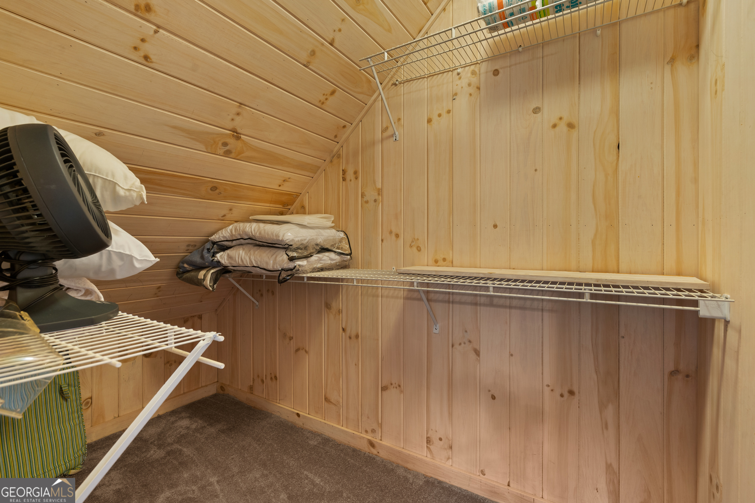 1387 Valley Street Clayton, GA 30525 - Photo 34 of 59 a view of a room with racks on the wall