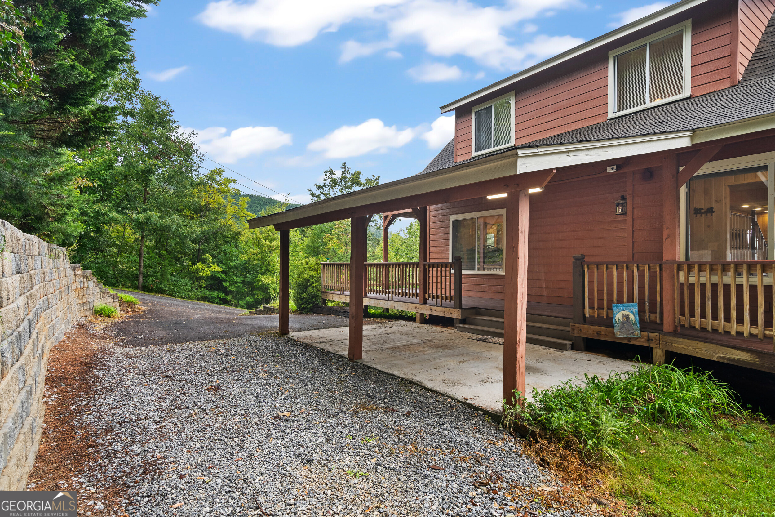 1387 Valley Street Clayton, GA 30525 - Photo 46 of 59 a view of a house with a yard and wooden fence