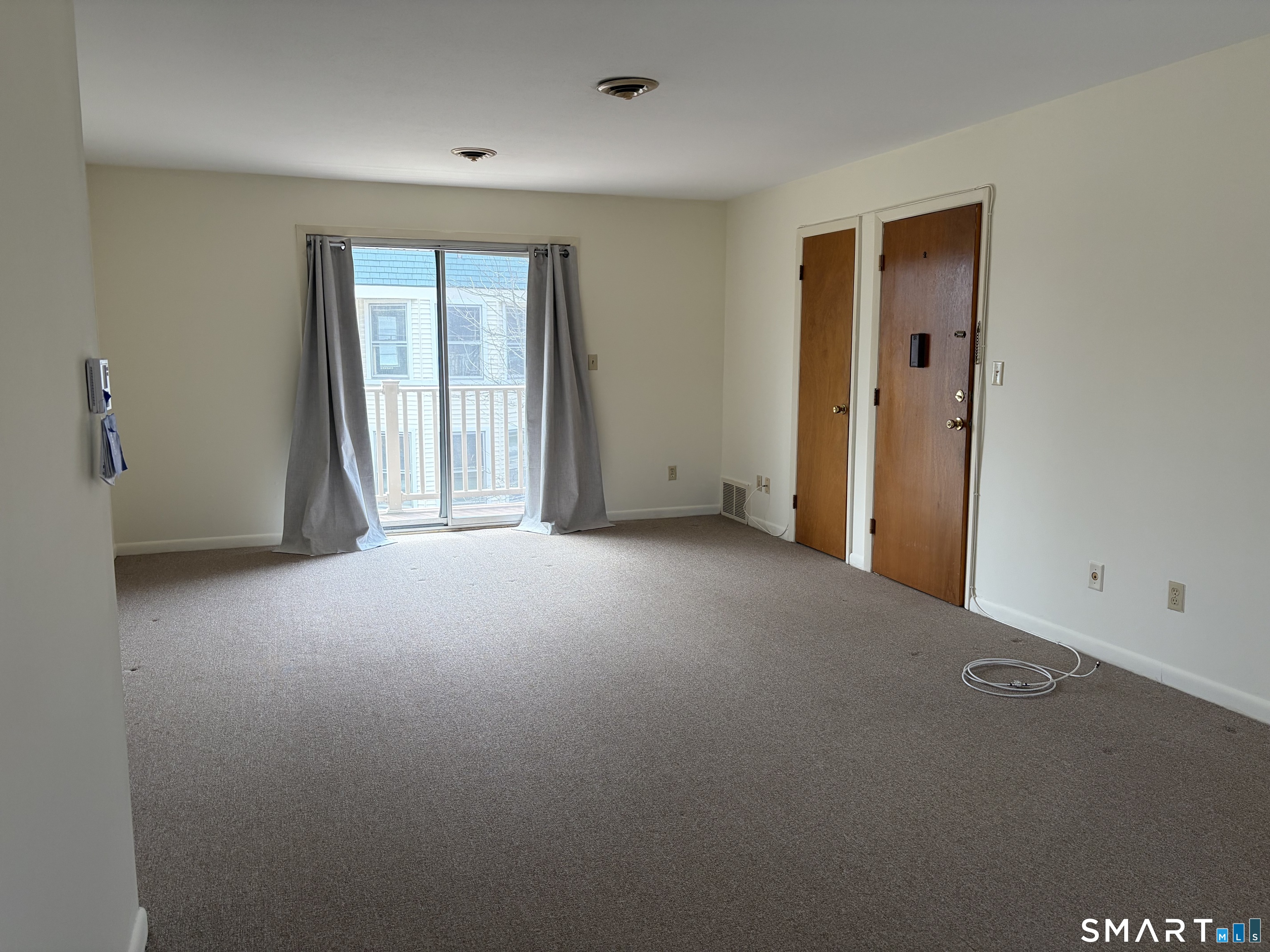 888 Main Street Torrington, CT 06790 - Photo 12 of 22 Slider to deck off living room