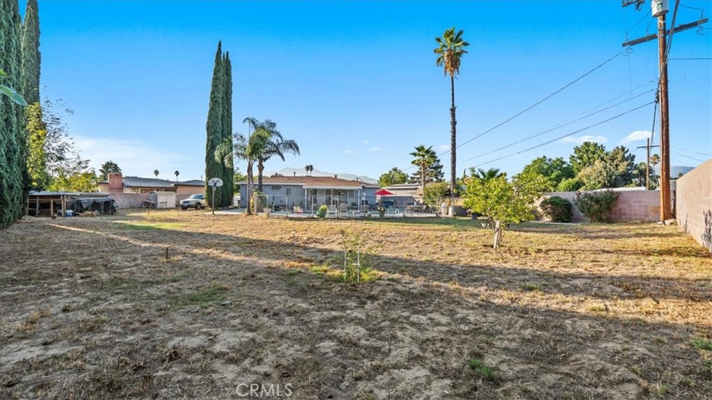 215 West Valencia Street Rialto, CA 92376 - Photo 17 of 17 a view of street with tall buildings