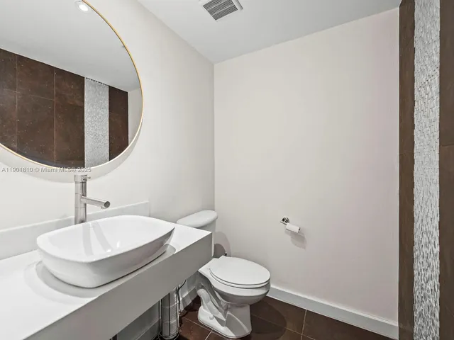 a view of swimming pool from a balcony