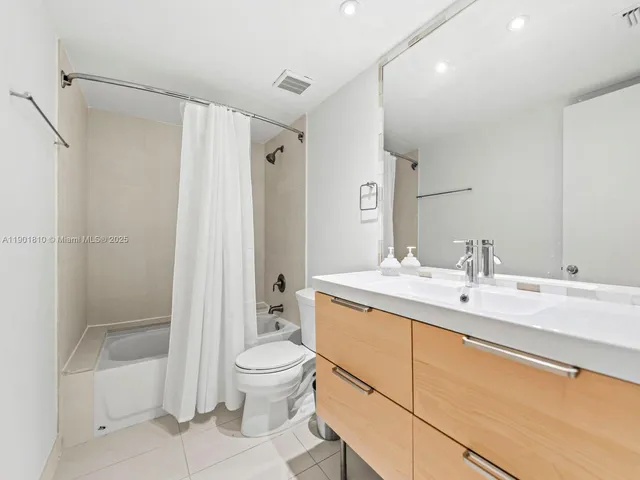 a living room with a couch and a table