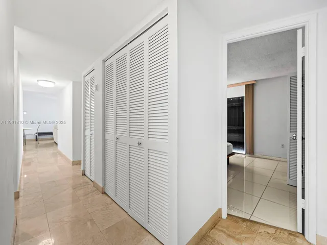a kitchen with a sink and a stove top oven
