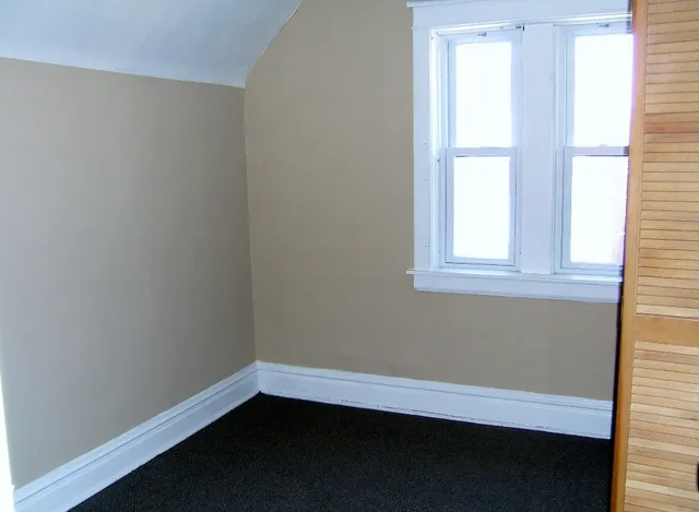 an empty room with a window