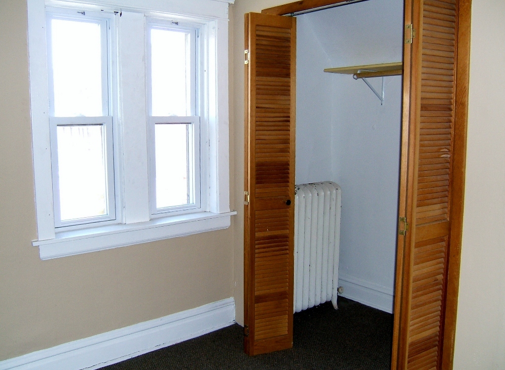 2137 West Chicago Avenue Chicago, IL 60622 - Photo 6 of 7 a view of front door with wooden floor