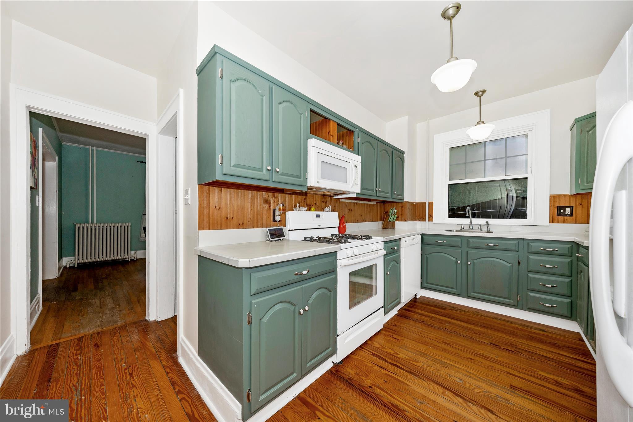 707 Summit Avenue Hagerstown, MD 21740 - Photo 15 of 54 a kitchen with stainless steel appliances granite countertop a stove and a sink
